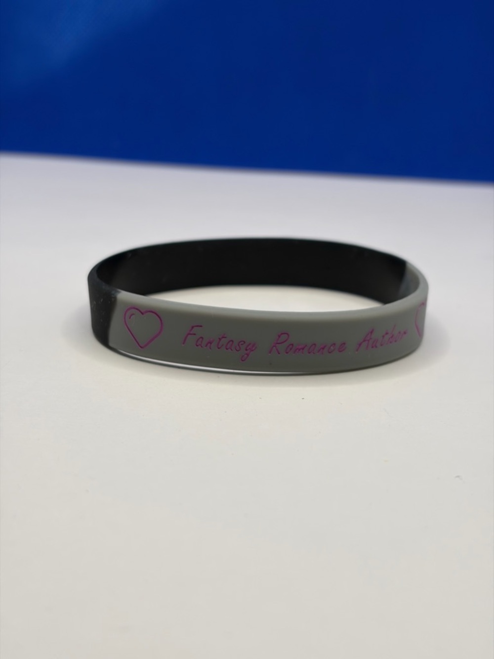 💜 5/$15 - Rebecca Jose Author Black Silicone Wristband - Pink Accent - Picture 3 of 5